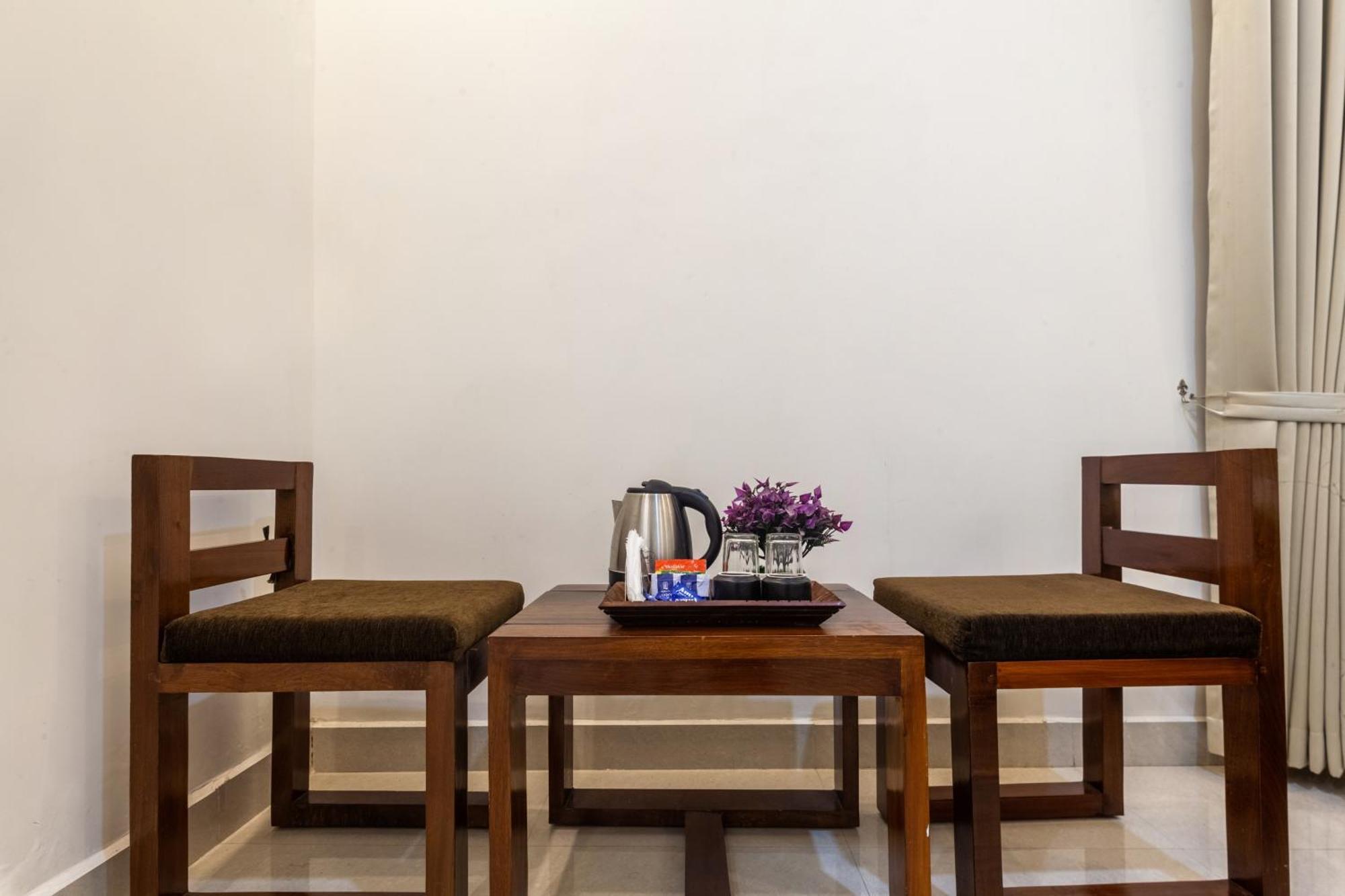 Treebo Sans Sarav Kushalnagar Hotel Madikeri Buitenkant foto